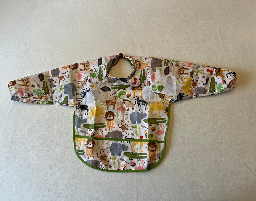 Babero impermeable con mangas Jungle