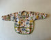 Babero impermeable con mangas Jungle